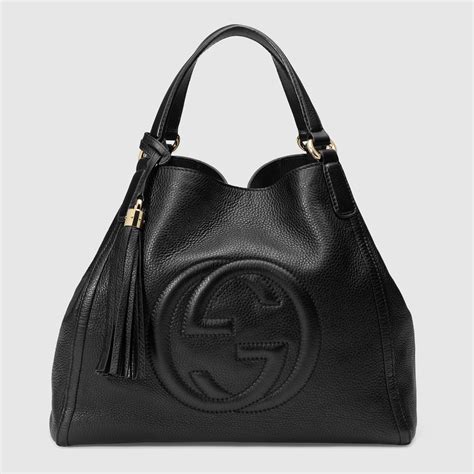 white leather gucci bag|black gucci side bag.